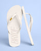 Cream EVA foam flip flops with gold alloy BRIDE charm on the straps