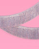 Pastel rainbow iridescent fringe garland hung as party decor
