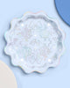 Blue paper party plates with white and iridescent detailing