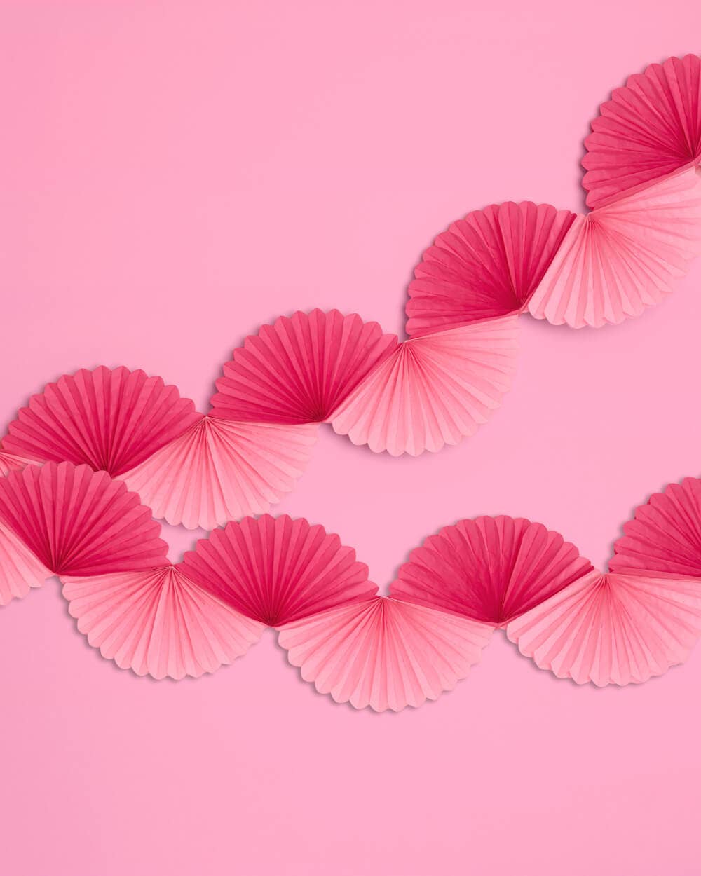 Pink and hot pink tissue paper fan garland