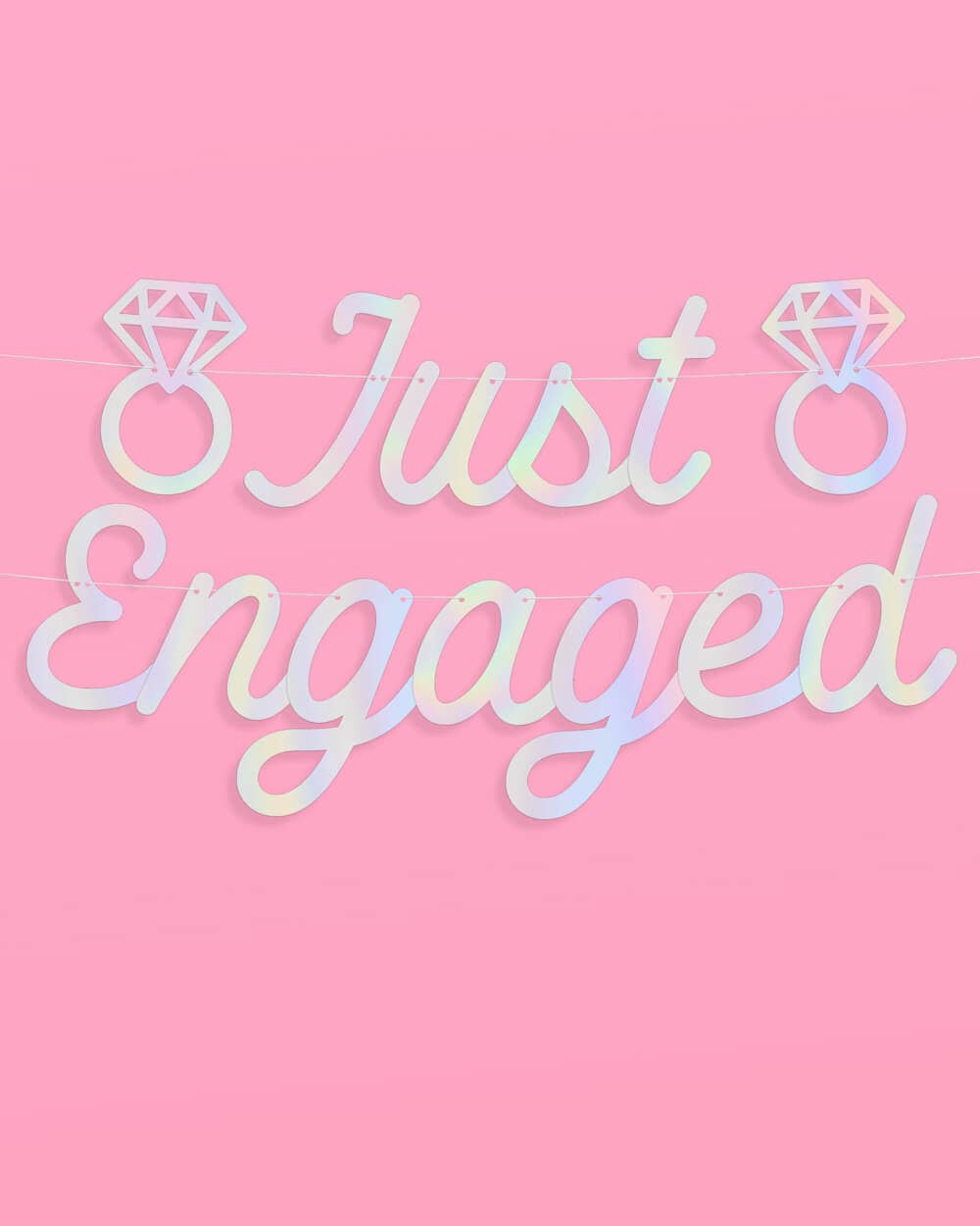 Just Engaged iridescent foil banner with diamond ring cutouts