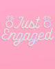 Just Engaged iridescent foil banner with diamond ring cutouts