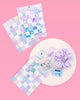 Checkered print hangover recovery pouches with iridescent foil backs