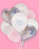 Engagement balloon set in matte white, iridescent foil hearts, clear, and pearl