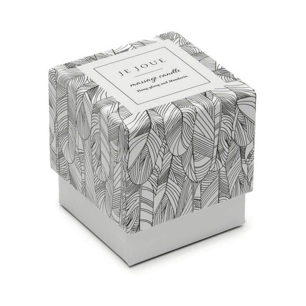 Je Joue Luxury Massage Candle Ylang Ylang & Mandarin, jar beside patterned gift box