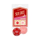 Sex Dice All-Inclusive red and pink 12-sided dice in front of the Wood Rocket blister card