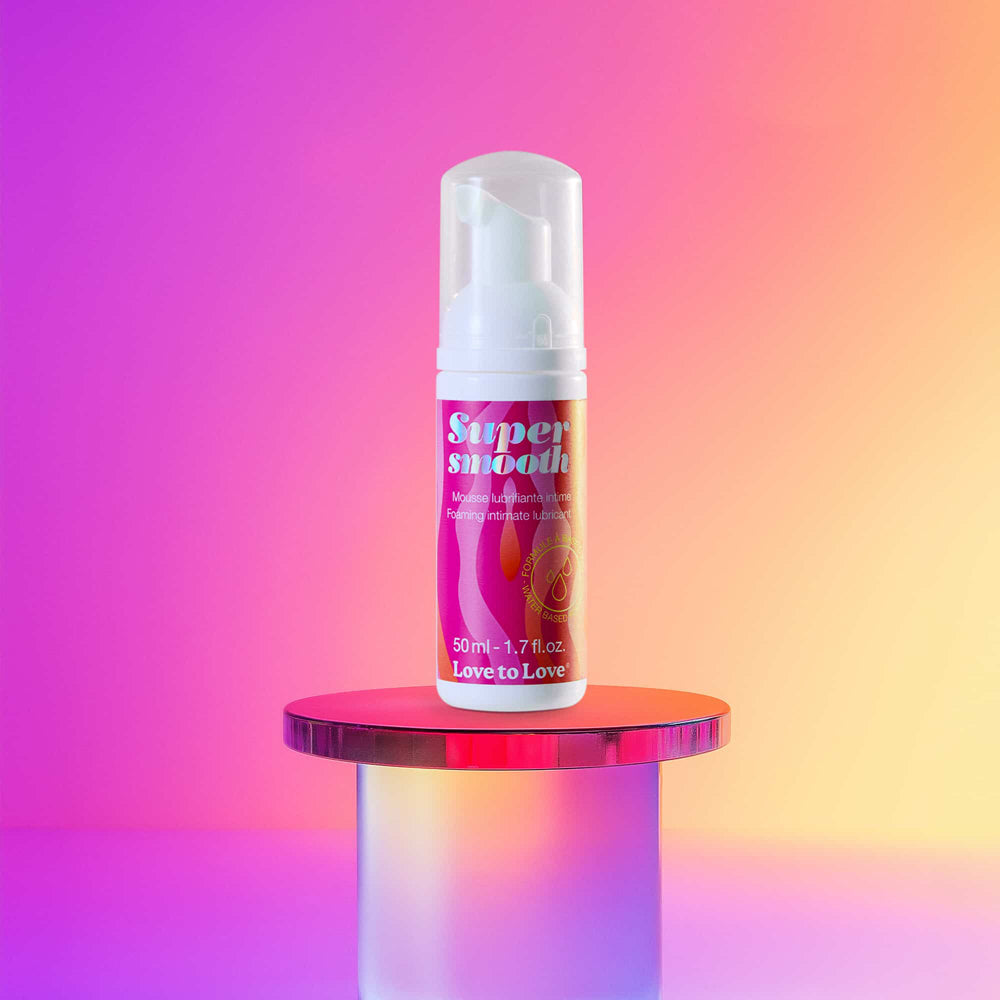 Love to Love Super Smooth Foaming Intimate Lubricant, pump bottle on a pink pedestal