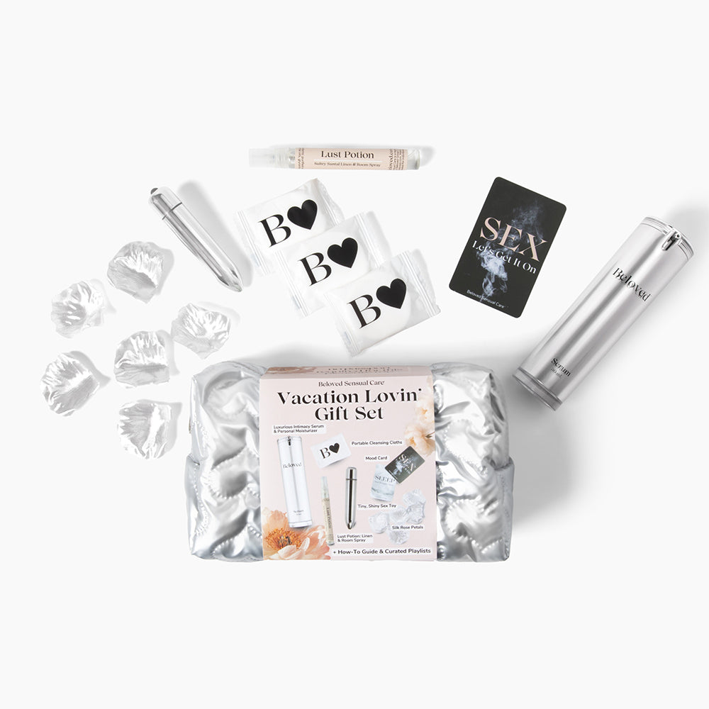 Beloved Vacation Lovin' Gift Set contents with quilted case, intimacy serum, bullet vibrator, cleansing cloths and silver rose petals
