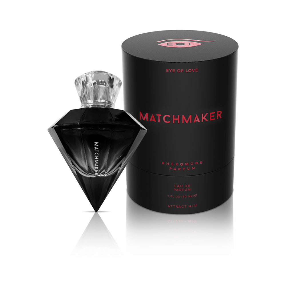Matchmaker Black Diamond faceted black glass bottle with clear cap beside its black cylinder case