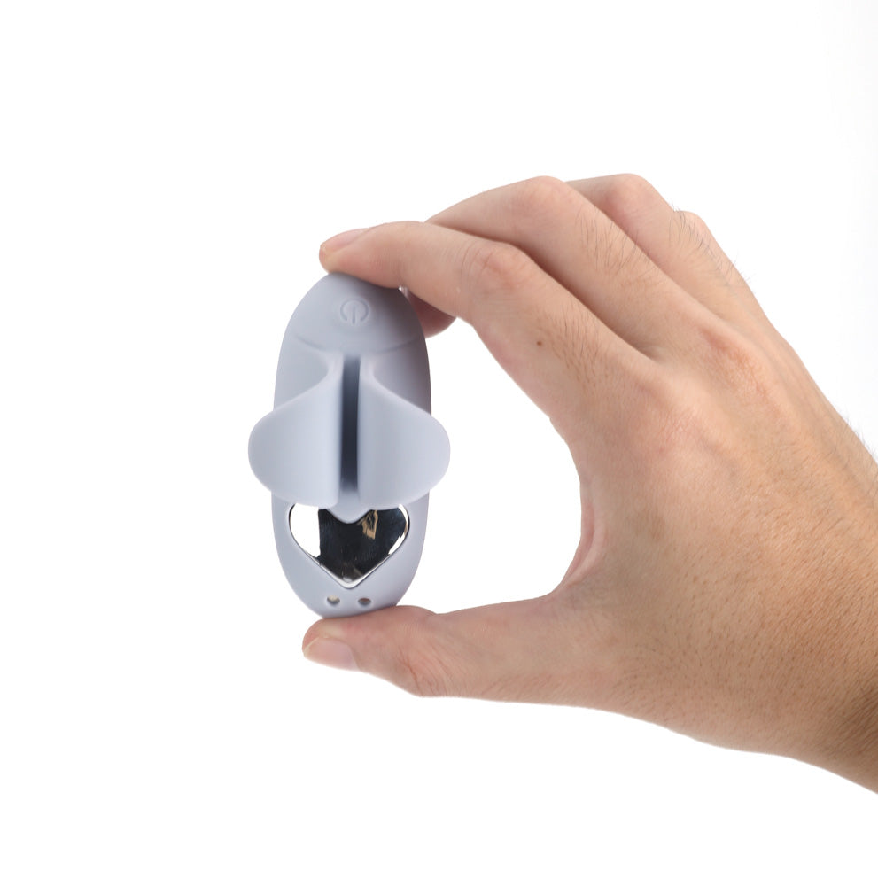 Kiko finger massager showing the butterfly finger holder