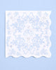 White cocktail napkins with blue and iridescent foil bridal illustrations and wavy edges