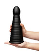 b-Vibe Cone Tapered and Ribbed Dildo in Black, held in hands for scale