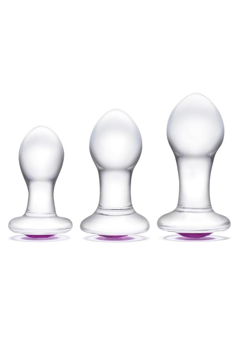 Clear glass butt plugs with purple gem bases, set of three