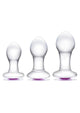 Clear glass butt plugs with purple gem bases, set of three