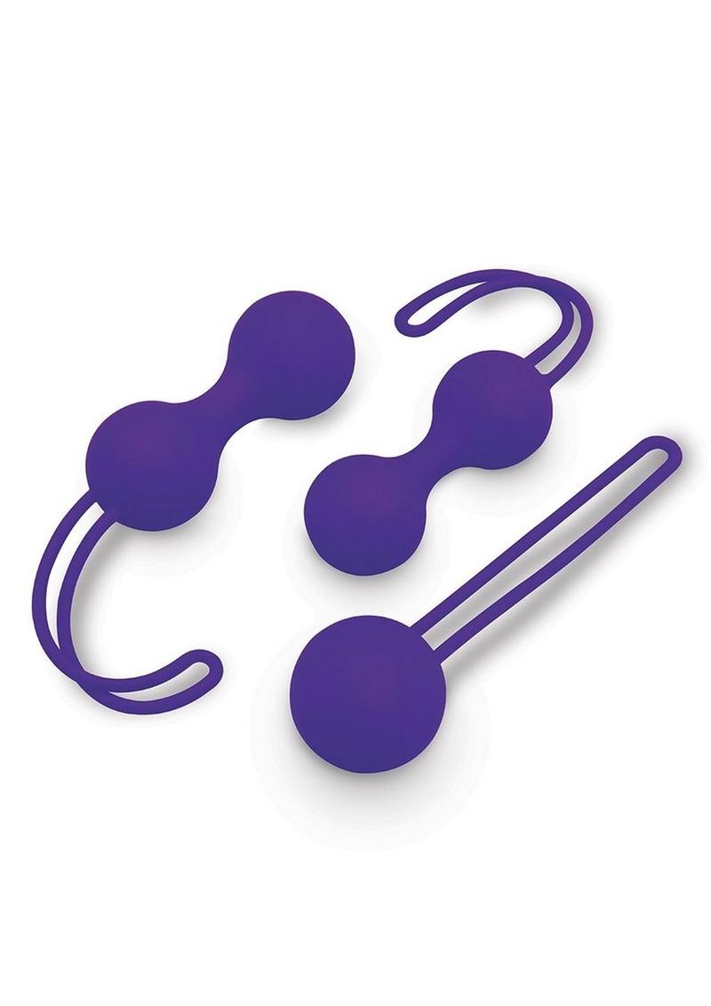 Purple silicone kegel balls, lying angled view