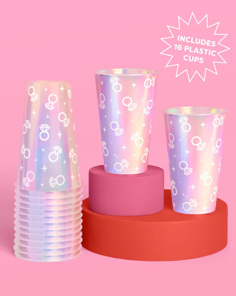 Iridescent plastic party cups printed with diamond rings and sparkle icons
