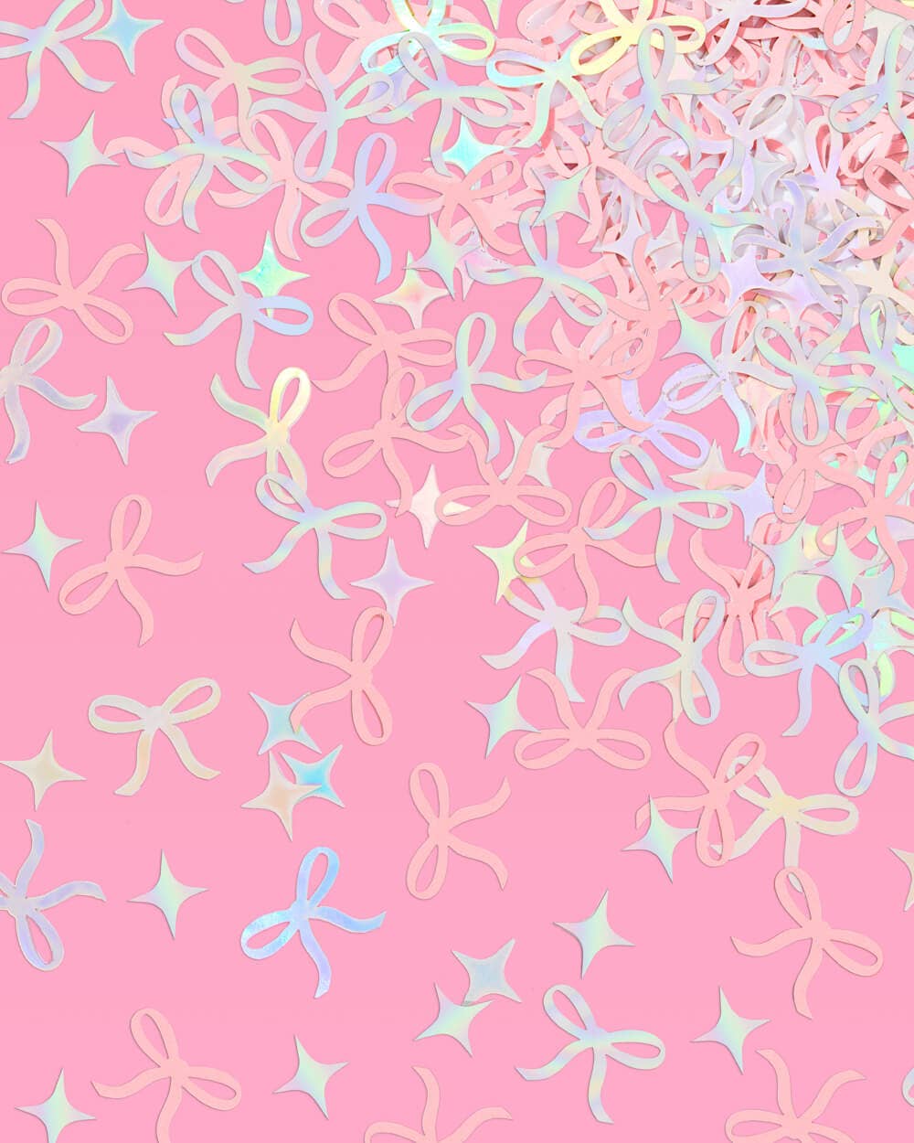 Pink and iridescent foil bow confetti with sparkles