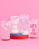 Western cow print and Lets Go Girls reusable drink pouches with pink straws