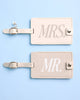 Ivory faux leather Mr and Mrs luggage tags with champagne gold hardware