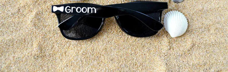 Black party sunglasses with GROOM lettering on the lenses