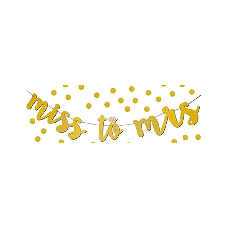 Gold glitter Miss To Mrs banner with diamond ring pennants