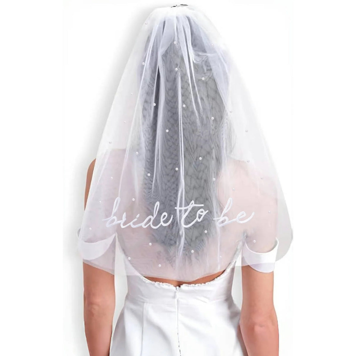 Layered white tulle veil with embroidered Bride To Be lettering and pearls