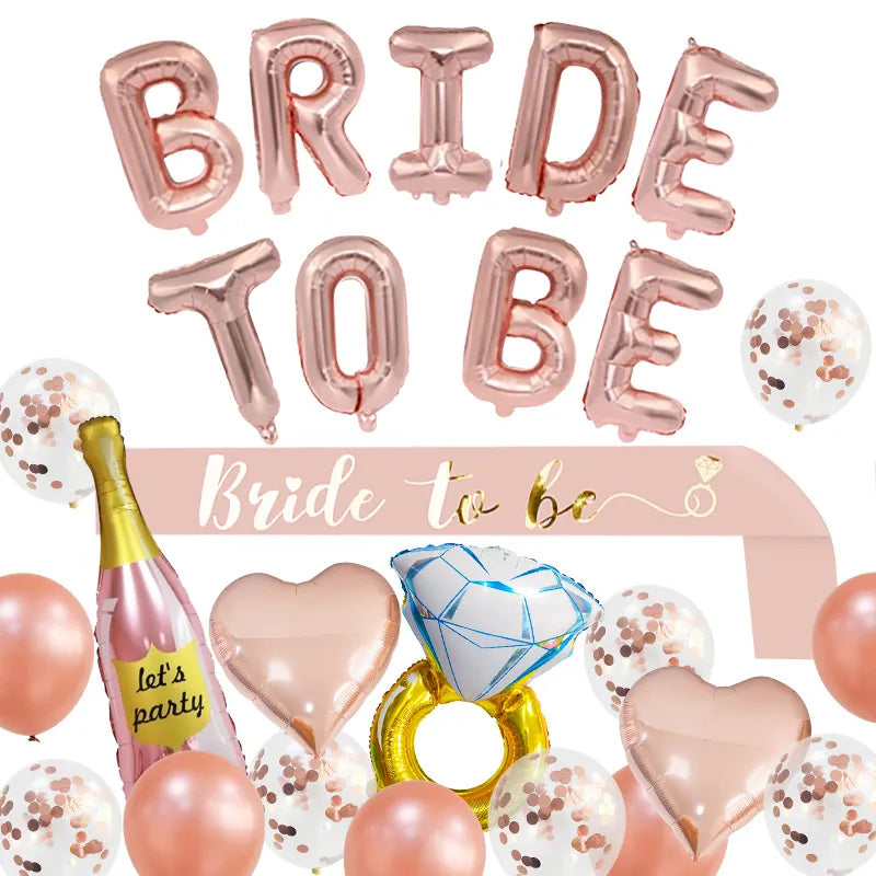 Rose gold Bride To Be balloon set with champagne, diamond ring and heart balloons and a sash