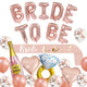 Rose gold Bride To Be balloon set with champagne, diamond ring and heart balloons and a sash