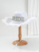 White felt bride cowboy hat with rhinestone lettering and feather fringe