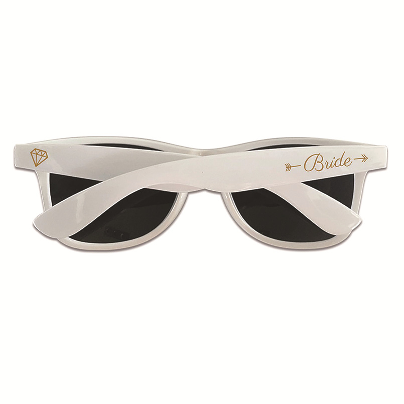 White party sunglasses with gold Bride script between arrows on the arm and a gold diamond on the other arm