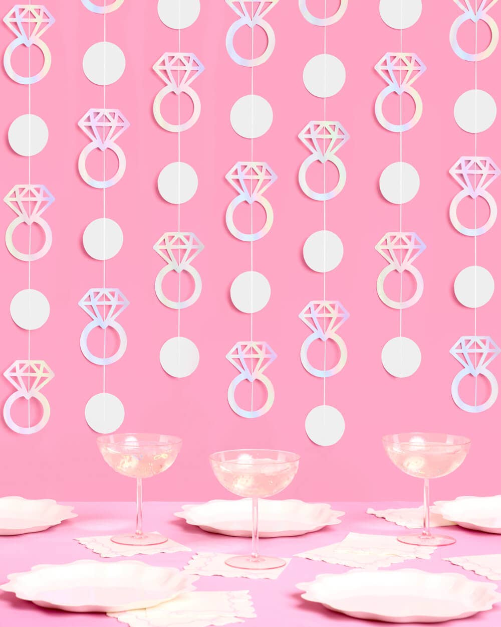 Iridescent foil engagement ring garland on white string