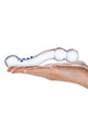 Glas Curved G-Spot Glass Textured Dildo in Clear with blue ridges, resting on a hand for scale