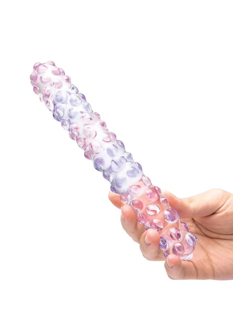 Glas Purple Rose Glass Nubby Dildo in Clear with pink nubs, held in hand for scale