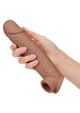 Chocolate Performance Maxx Life-Like Extension 8 inch held in hand