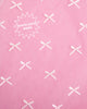 Close up of white satin mini bows on tulle