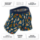 Navy dogs and drinks boxer brief with feature callouts for moisture wicking, breathability and support