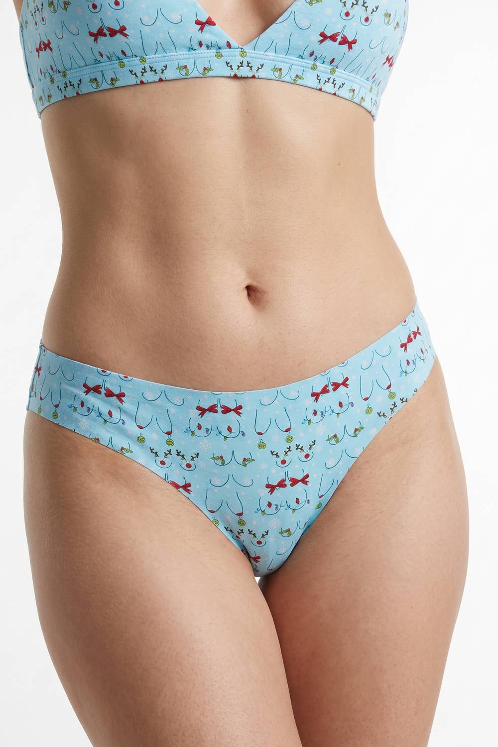 Light blue Christmas print seamless thong, close front view