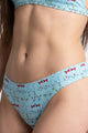 Light blue seamless thong with a Christmas ornament bust print, front view